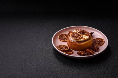 Cinnamon roll, a sweet bun with citrus, cherries, and chocolate, a Danish dessert with cream. Cinnamon roll as a food background for your design