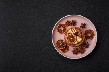 Cinnamon roll, a sweet bun with citrus, cherries, and chocolate, a Danish dessert with cream. Cinnamon roll as a food background for your design