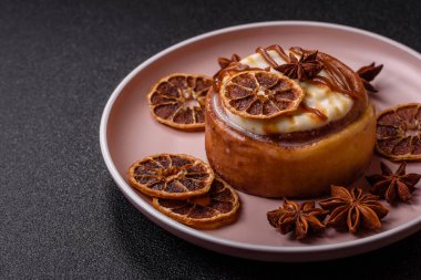 Cinnamon roll, a sweet bun with citrus, cherries, and chocolate, a Danish dessert with cream. Cinnamon roll as a food background for your design