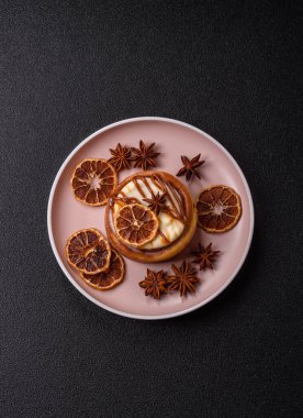 Cinnamon roll, a sweet bun with citrus, cherries, and chocolate, a Danish dessert with cream. Cinnamon roll as a food background for your design