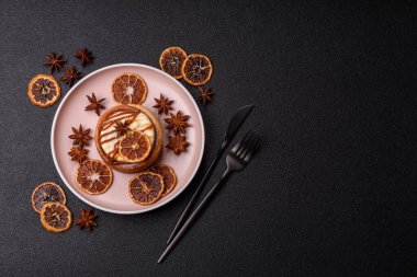 Cinnamon roll, a sweet bun with citrus, cherries, and chocolate, a Danish dessert with cream. Cinnamon roll as a food background for your design