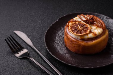 Cinnamon roll, a sweet bun with citrus, cherries, and chocolate, a Danish dessert with cream. Cinnamon roll as a food background for your design