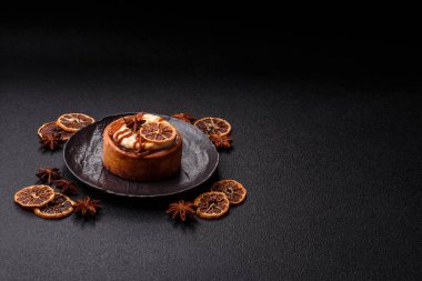 Cinnamon roll, a sweet bun with citrus, cherries, and chocolate, a Danish dessert with cream. Cinnamon roll as a food background for your design