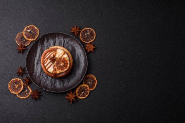 Cinnamon roll, a sweet bun with citrus, cherries, and chocolate, a Danish dessert with cream. Cinnamon roll as a food background for your design