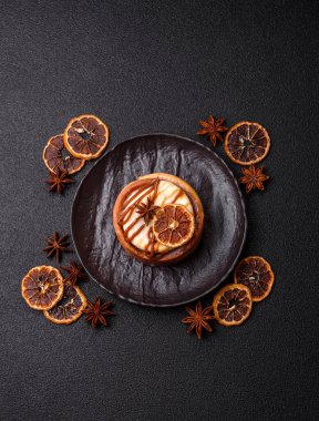 Cinnamon roll, a sweet bun with citrus, cherries, and chocolate, a Danish dessert with cream. Cinnamon roll as a food background for your design