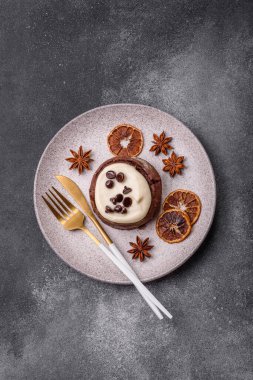 Cinnamon roll, a sweet bun with citrus, cherries, and chocolate, a Danish dessert with cream. Cinnamon roll as a food background for your design