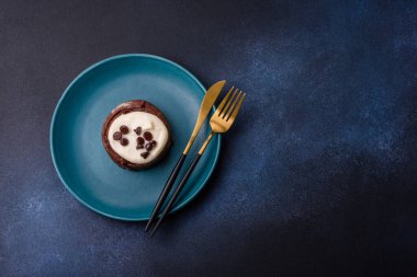 Cinnamon roll, a sweet bun with citrus, cherries, and chocolate, a Danish dessert with cream. Cinnamon roll as a food background for your design