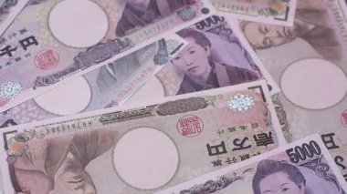 Japonya, Japon yeni kağıt banknotlar, iş için para, finansal işlemler ve anlaşmalar. Tasarımınız için finansal bir arkaplan olarak Japonca yen.