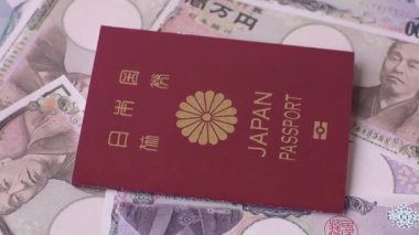Japanese passport or id document with tickets for flight, travel, border crossing. Japan passport and tickets as a background for your design