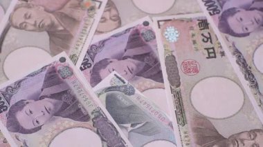 Japonya, Japon yeni kağıt banknotlar, iş için para, finansal işlemler ve anlaşmalar. Tasarımınız için finansal bir arkaplan olarak Japonca yen.