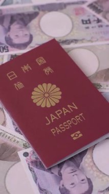 Japanese passport or id document with tickets for flight, travel, border crossing. Japan passport and tickets as a background for your design