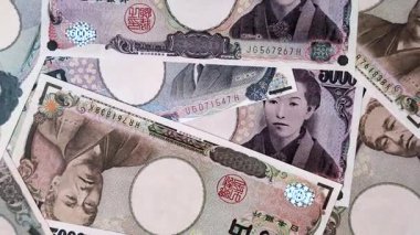Japonya, Japon yeni kağıt banknotlar, iş için para, finansal işlemler ve anlaşmalar. Tasarımınız için finansal bir arkaplan olarak Japonca yen.