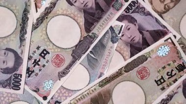 Japonya, Japon yeni kağıt banknotlar, iş için para, finansal işlemler ve anlaşmalar. Tasarımınız için finansal bir arkaplan olarak Japonca yen.