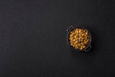 Dried chamomile flowers, herbal tea in a bowl for a hot morning drink. Dried chamomile as a background for your design.