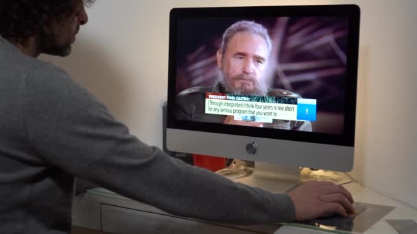 Europe Milan 2022 Watching Television News Laptop Computer Fidel Castro — стокове відео