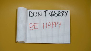 Business man with write Don't worry be happy , Time is now ( carpe diem ) - writing positive message and lifestyle