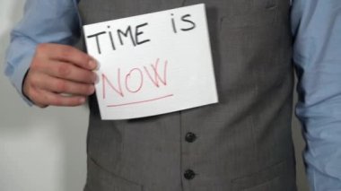 Business man with write Don't worry be happy , Time is now - positive message and lifestyle