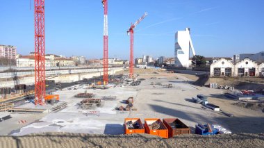 EUROPE, ITALY, MILAN 2023 - Drone aerial view of Scalo Porta Romana, building construction of Olympic Village for Milan-Cortina 2026 Winter Olympics games in downtown of the city near Prada Tower  