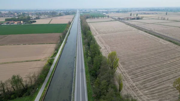 stock image Europe, Italy, Milan - Water emergency and drought in Lombardy, lack of water for irrigation of cultivated fields - drone view of rice fields with no water - agriculture and dry land