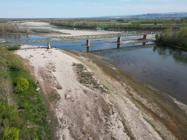 stock image Europe, Italy, Pavia Drought, and aridity river - Po and Ticino , dry beach of sand and water shortage, water emergency in Lombardy - Drone view in Ponte della Becca - Climate change global warming