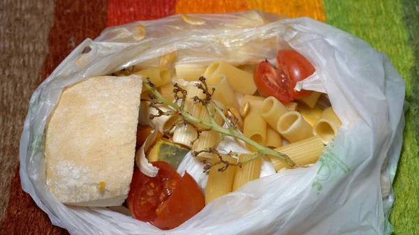 Separate collection of organic and wet domestic waste at home with biodegradable plastic bag - sustainable circular economy - Save the Planet by avoiding waste and pollution - trash can
