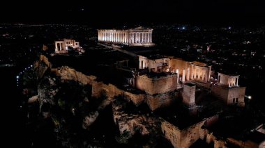  Aerial view of Acropolis in Greece by night , Parthenon in Athens, sigthseeing destination Unesco World Heritage in Atene. clipart