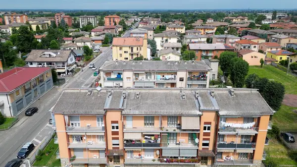 stock image Italy ,Broni 07,13,2024 , FibronitAsbestos eternit is a dangerous material for human health due to lung cancer asbestosis, roofs a of houses made with asbestos cement , must be reclaimed