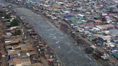 Gana, Accra, 10,18,24 AGBOGBLOSHIE çalışanı Afrika 'nın en büyük gecekondu çöplüğünde elektronik ve plastik atık için yaşıyor. Odaw Nehri Yüksek Çevre Zehirli Kirlilik Alanı, İklim Değişikliği 