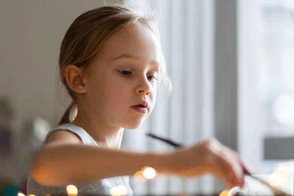 Little girl helping with baking at home