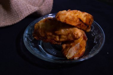 Godo tipik bir Endonezya yemeğidir. Patates kızartması un kaplı tatlı patatesten yapılır ve sonra kızarır..