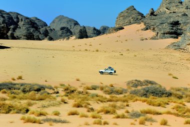 SAND DUNES, ROCKS AND THE SAHARA DESERT LANDSCAPES IN ALGERIA