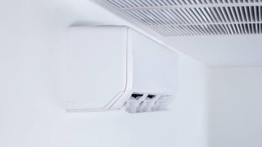split type air conditioner wall hanging white background
