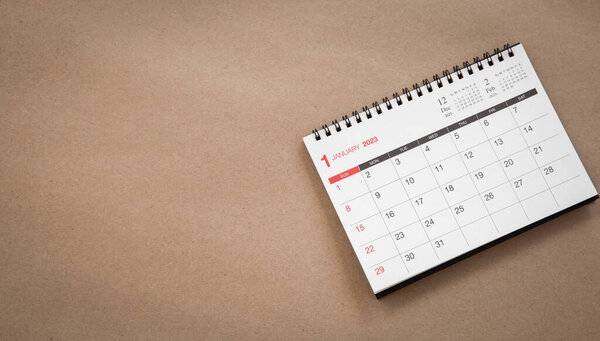 white calendar on brown background