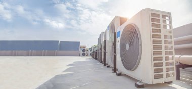 Air conditioning (HVAC) installed on the roof of industrial buildings.