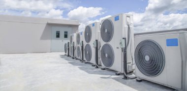 Air conditioning (HVAC) installed on the roof of industrial buildings.