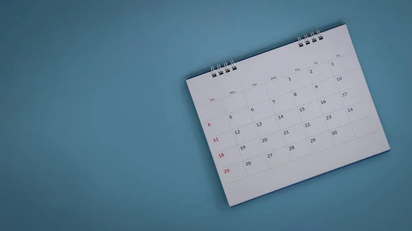 Biały Kalendarz Kładzie Się Niebieskim Tle Koncepcji Planowania Zdjęcie Stockowe