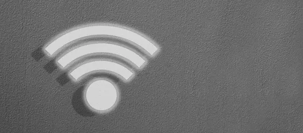 Wifi icon on old cement wall background