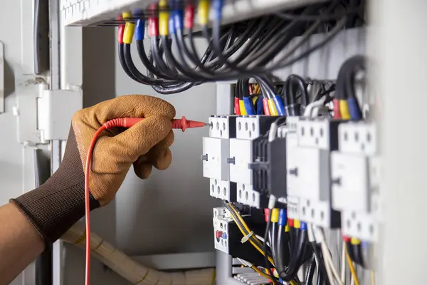 Electricians use meters to check the operation of electrical equipment.