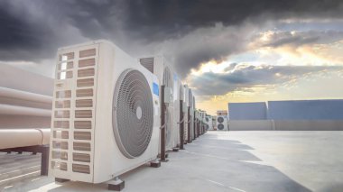 Air conditioning (HVAC) installed on the roof of industrial buildings.