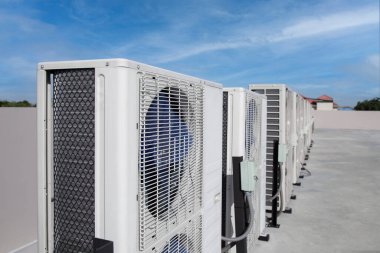 Air conditioning (HVAC) installed on the roof of industrial buildings.