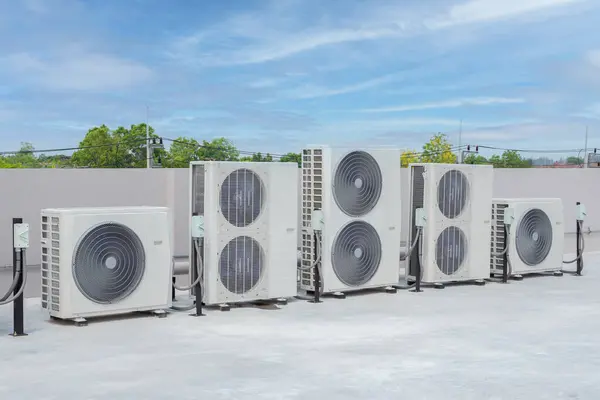 Air conditioning (HVAC) installed on the roof of industrial buildings.
