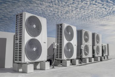 Air conditioning (HVAC) installed on the roof of industrial buildings.