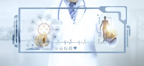 Medical Technology diagnosis of cardiac concepts. Doctor Hand pointing to Virtual screen body diagnosis.  Medical Technology analysis the Network connection virtual screen. Hospital blur background