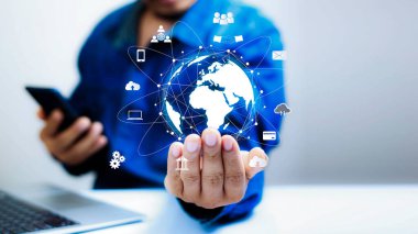 business people sit and work on information technology networks internet connection Wireless devices around the world Information technology is essential for businesses in a digital world.