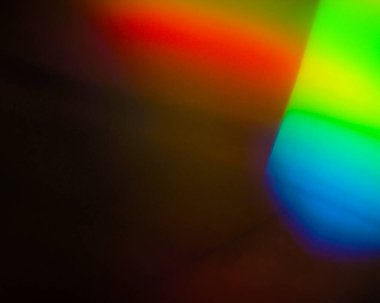 Renkli gökkuşağı arkaplan ışığı parlak kaplama spektrum dokusunda sızar