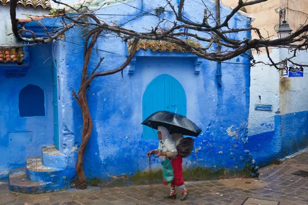 stock image Old woman on street, Chefchaouen Morocco 