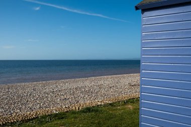 Beach and beach hut at Budleigh Salterton, East Devon, England, United Kingdom