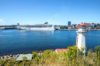 Cruise ship Norwegian Pearl at Halifax Harbour and Georges Island Lighthouse  view from Georges Island - Halifax, Nova Scotia, Canada