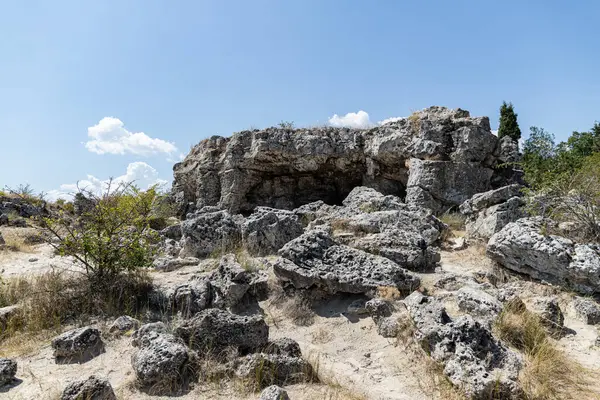 stock image Aksakovo, Bulgaria - 14.08.2020 Pobiti Kamani, sand and limestone rock formation, cave like structure, nature phenomenon near Varna