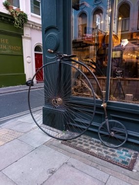 An old Penny-farthing outside a shop in Camden, London, UK